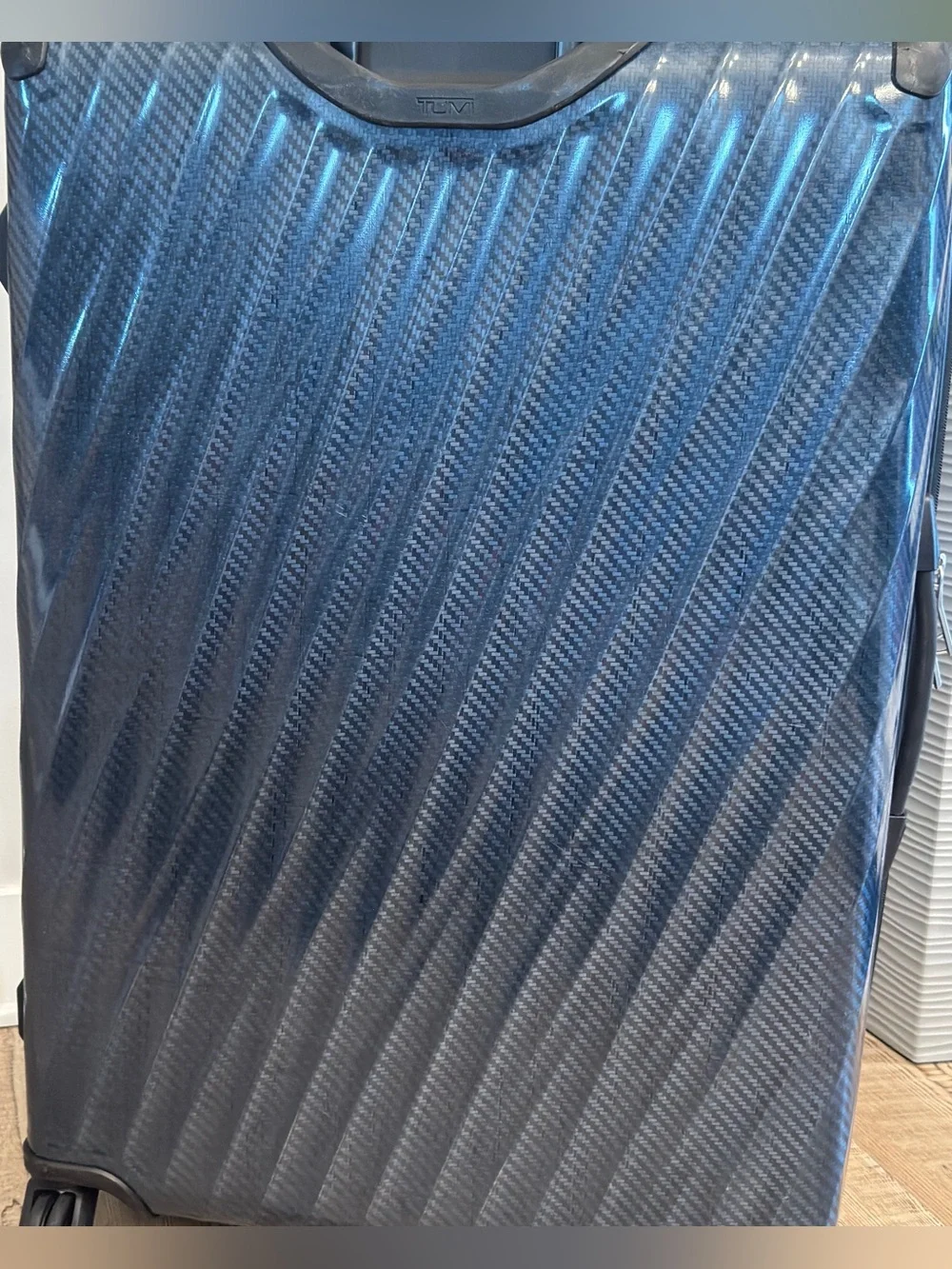 Tumi Large Expandable Checked Glossy Navy Hard-Shell Spinner Luggage suitcase